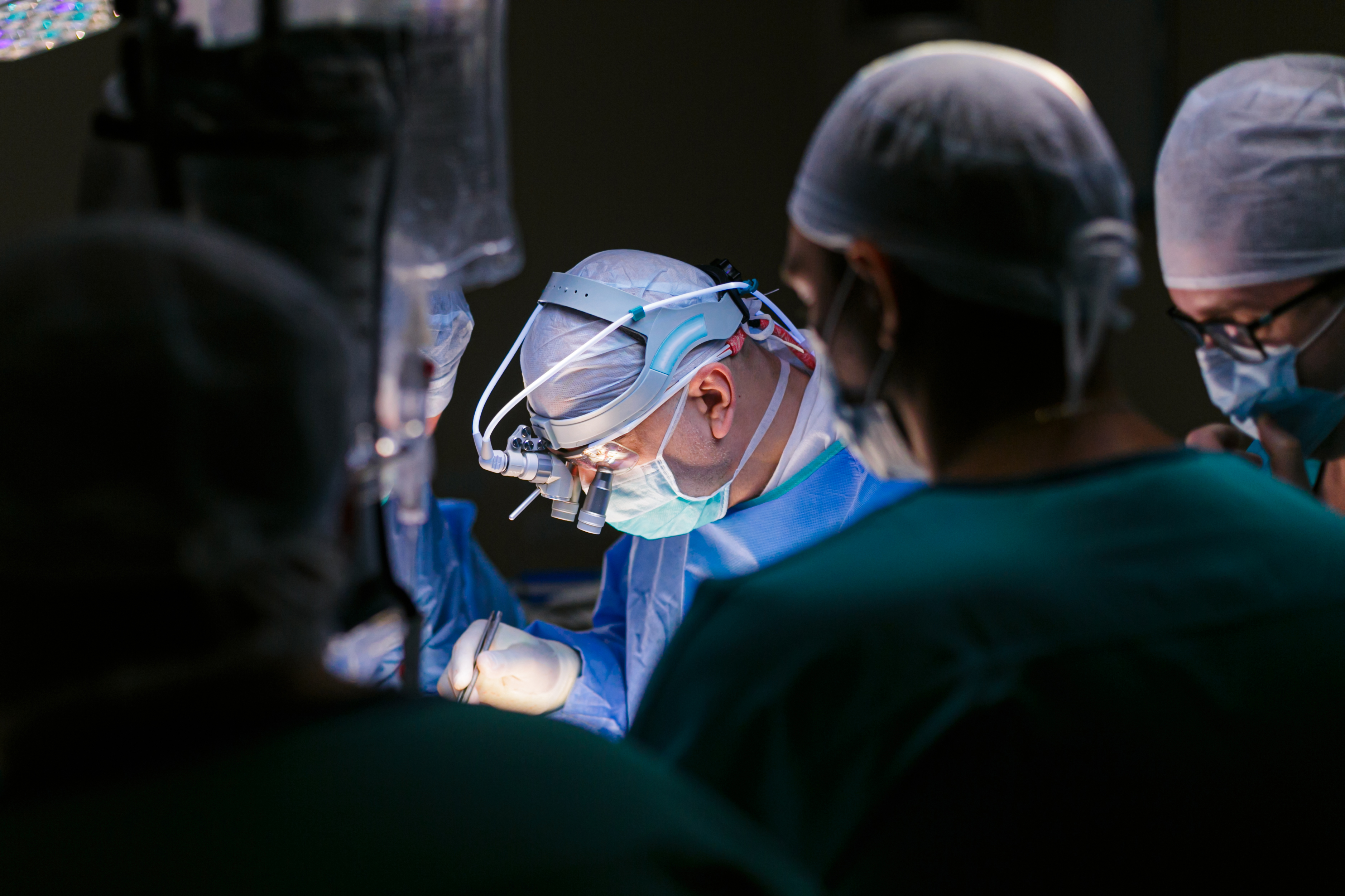 Neurophysiologist conducting IONM during vascular surgery.